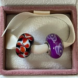 Two Pandora style beads.